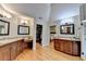 Expansive bathroom features dual vanities, a walk-in closet, and an entrance to the main bedroom at 125 Stoney Ridge Dr, Alpharetta, GA 30022