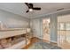 A bright bedroom showcasing a cozy bunk bed adjacent to a bathroom with views of the home's interior at 125 Stoney Ridge Dr, Alpharetta, GA 30022