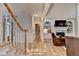 Hallway leading to the living room featuring hardwood floors and fine trim at 125 Stoney Ridge Dr, Alpharetta, GA 30022