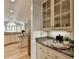 Kitchen with hardwood floors, granite countertops and stainless steel appliances at 125 Stoney Ridge Dr, Alpharetta, GA 30022