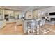 Spacious kitchen with stainless appliances, granite countertops, and an island with bar seating at 125 Stoney Ridge Dr, Alpharetta, GA 30022
