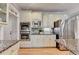 Kitchen features stainless steel appliances, double ovens, and granite countertops at 125 Stoney Ridge Dr, Alpharetta, GA 30022