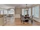 Open-concept living and dining area with hardwood floors and bright natural light at 125 Stoney Ridge Dr, Alpharetta, GA 30022