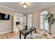 Office with french doors, hardwood floors, and bright natural light at 125 Stoney Ridge Dr, Alpharetta, GA 30022