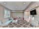 Bright, spacious playroom with comfortable seating, a large TV, and plenty of room for activities at 125 Stoney Ridge Dr, Alpharetta, GA 30022