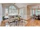 Bright sun room with shuttered windows, a ceiling fan, and a comfortable couch at 125 Stoney Ridge Dr, Alpharetta, GA 30022