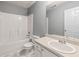 The bathroom features a tub-shower combo, toilet, and vanity with sink at 1303 Flat Shoals Rd, Atlanta, GA 30349
