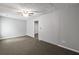 The bedroom features neutral walls, carpet, and an open doorway at 1303 Flat Shoals Rd, Atlanta, GA 30349