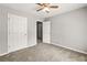 Spacious bedroom with carpeted floors and two closets at 1303 Flat Shoals Rd, Atlanta, GA 30349