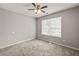 Bedroom with a ceiling fan and large window at 1303 Flat Shoals Rd, Atlanta, GA 30349