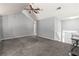 Spacious living room featuring vaulted ceilings and neutral gray walls at 1303 Flat Shoals Rd, Atlanta, GA 30349