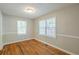 Cozy bedroom with hardwood floors, natural light and neutral paint, perfect for rest and relaxation at 1328 Lockhaven Sw Cir, Atlanta, GA 30311