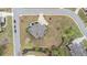 Aerial view of a landscaped property with a large home and a circular driveway at 3039 Malbec Vly, Acworth, GA 30101