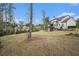 Large backyard with a well-maintained lawn and the house in the background at 3039 Malbec Vly, Acworth, GA 30101