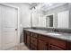 Double vanity bathroom with granite countertops and large mirror at 3039 Malbec Vly, Acworth, GA 30101