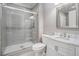 Modern bathroom with gray subway tile shower and white vanity with marble countertop at 3039 Malbec Vly, Acworth, GA 30101