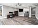 This office features wood floors, a coffee bar and a modern desk set against neutral colored walls at 3039 Malbec Vly, Acworth, GA 30101