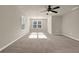 Bedroom with a ceiling fan and natural light shining through the window at 679 Barley Hill Ln, Sugar Hill, GA 30518
