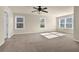 Bright and spacious bedroom with multiple windows and neutral carpeting at 679 Barley Hill Ln, Sugar Hill, GA 30518
