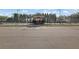 Community recreational area with tennis courts and a covered pavilion, offering residents an active lifestyle at 679 Barley Hill Ln, Sugar Hill, GA 30518