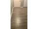 Finished basement with gray plank flooring and white doors at 812 Seasons Pkwy, Norcross, GA 30093