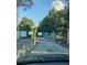 Gated community entrance with security features and lush landscaping at 812 Seasons Pkwy, Norcross, GA 30093