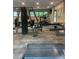Well-equipped gym with modern machines and natural light from large windows at 812 Seasons Pkwy, Norcross, GA 30093