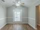 Cozy bedroom offers natural light and a calming atmosphere, perfect for relaxation at 2212 Butner Sw Rd, Atlanta, GA 30331