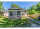 Charming brick home featuring a well-maintained lawn and inviting front entrance at 2212 Butner Sw Rd, Atlanta, GA 30331