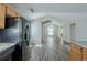 Open floorplan with a view from the kitchen to the dining and living areas at 2212 Butner Sw Rd, Atlanta, GA 30331