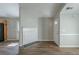 Bright living room features new wood flooring and fresh neutral paint at 2212 Butner Sw Rd, Atlanta, GA 30331