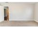 A cozy bedroom features neutral walls, carpet, and an open doorway at 498 Haven Ridge Dr, Stockbridge, GA 30281