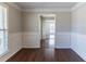 Dining room featuring beautiful paneling and hardwood floors, perfect for hosting gatherings at 498 Haven Ridge Dr, Stockbridge, GA 30281