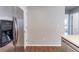 Kitchen featuring stainless steel appliances and hardwood floors, ready for culinary adventures at 498 Haven Ridge Dr, Stockbridge, GA 30281