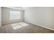 Bedroom showcasing natural light, carpet, and neutral colors at 5011 Wewatta Sw St, Atlanta, GA 30331