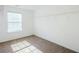 Bedroom with a window and neutral colored carpet at 5011 Wewatta Sw St, Atlanta, GA 30331