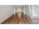 Elegant dining room featuring hardwood floors, decorative molding, and a staircase nearby at 5011 Wewatta Sw St, Atlanta, GA 30331