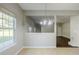 Kitchen dining area features a chandelier and natural light at 5011 Wewatta Sw St, Atlanta, GA 30331