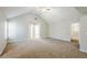 Spacious main bedroom featuring vaulted ceilings and neutral decor at 5011 Wewatta Sw St, Atlanta, GA 30331