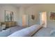 Spacious bedroom with neutral tones and comfortable seating and decor at 597 River Gardens Dr, Atlanta, GA 30354