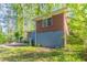 Back exterior of home featuring brick and painted concrete block at 2345 Leith Ave, Atlanta, GA 30344