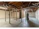 Unfinished basement with exposed pipes, support beams and water heater at 2345 Leith Ave, Atlanta, GA 30344