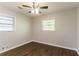 Bedroom with hardwood floors, a ceiling fan, and natural lighting at 2345 Leith Ave, Atlanta, GA 30344