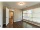 Comfortable bedroom with hardwood floors and a neutral color scheme at 2345 Leith Ave, Atlanta, GA 30344