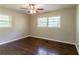 Bright bedroom with a ceiling fan, hardwood floors, and natural light at 2345 Leith Ave, Atlanta, GA 30344