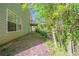 Backyard view of home with wooded area behind, including a small deck at 3568 Oakshire Se Way, Atlanta, GA 30354