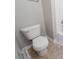 This bathroom features a toilet, a tiled floor, and a shower/bath combination at 3568 Oakshire Se Way, Atlanta, GA 30354