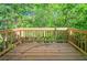 Wooden deck overlooking lush greenery, offering a serene outdoor space at 3568 Oakshire Se Way, Atlanta, GA 30354