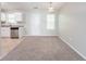 Dining area featuring neutral paint, tile floor in kitchen and a pendant light fixture at 3568 Oakshire Se Way, Atlanta, GA 30354