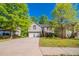 Charming home featuring a well-maintained lawn, two-car garage, and inviting entryway at 3568 Oakshire Se Way, Atlanta, GA 30354